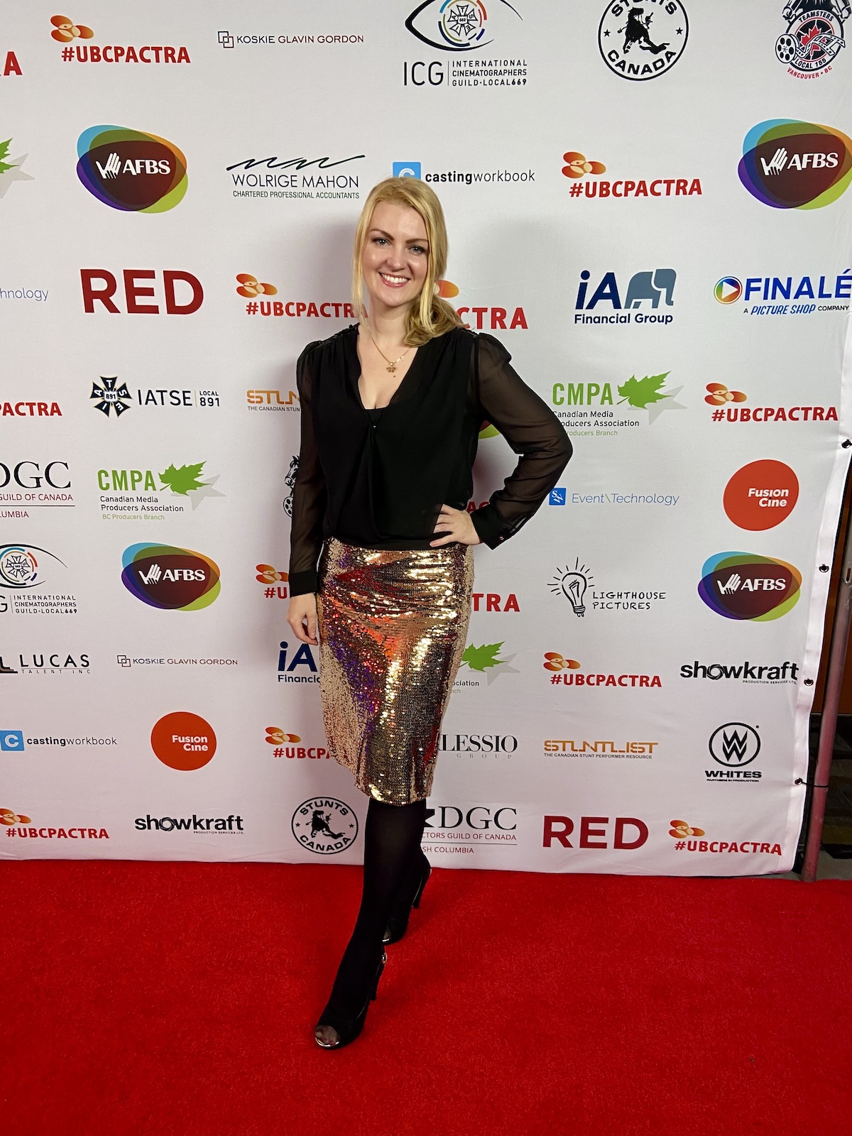 Eline Mets on the red carpet in front of a UBCP/ACTRA event backdrop